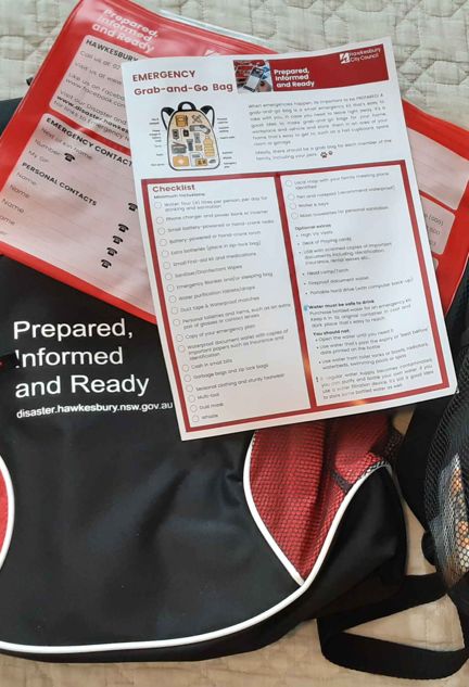 A grab and go checklist lying on top of a bag