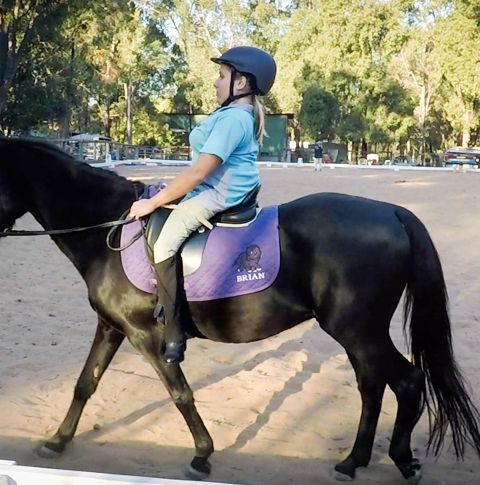 Bek riding pony.