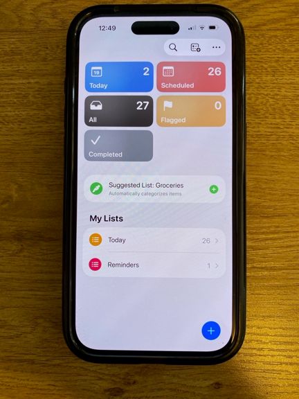a photo of a camera screen showing a task app