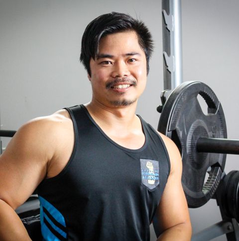 Nang in the gym smiling.