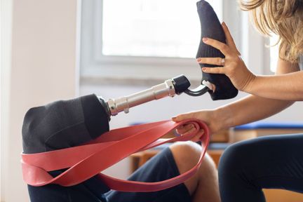 pilates reformer with prosthetic leg