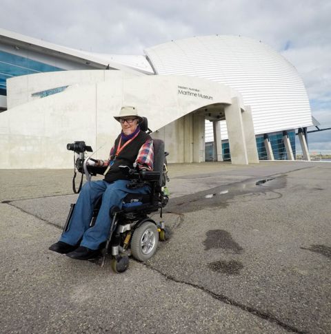 Rob outside WA Maritime Museum in wheelchair.