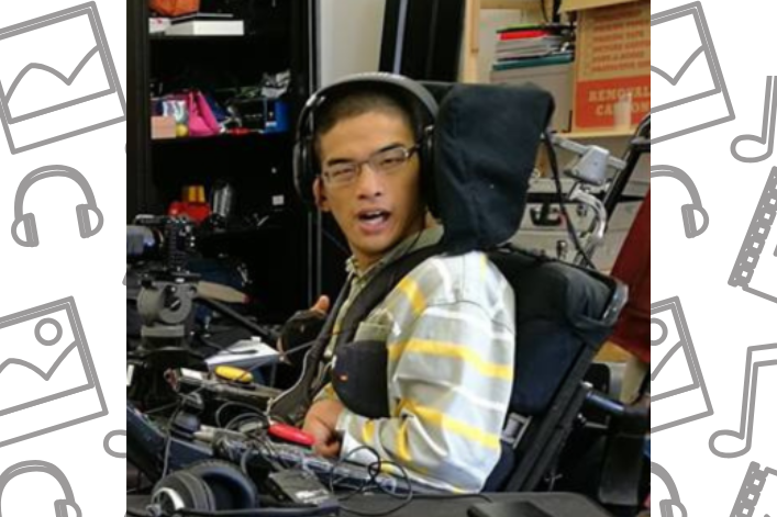 AT list SR header A photo of a young man looking at the camera, wearing headphones and sitting in a power wheelchair
