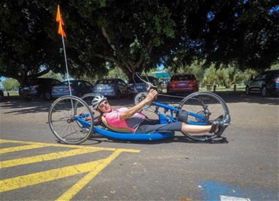 Louise Mofflin riding her handcycle