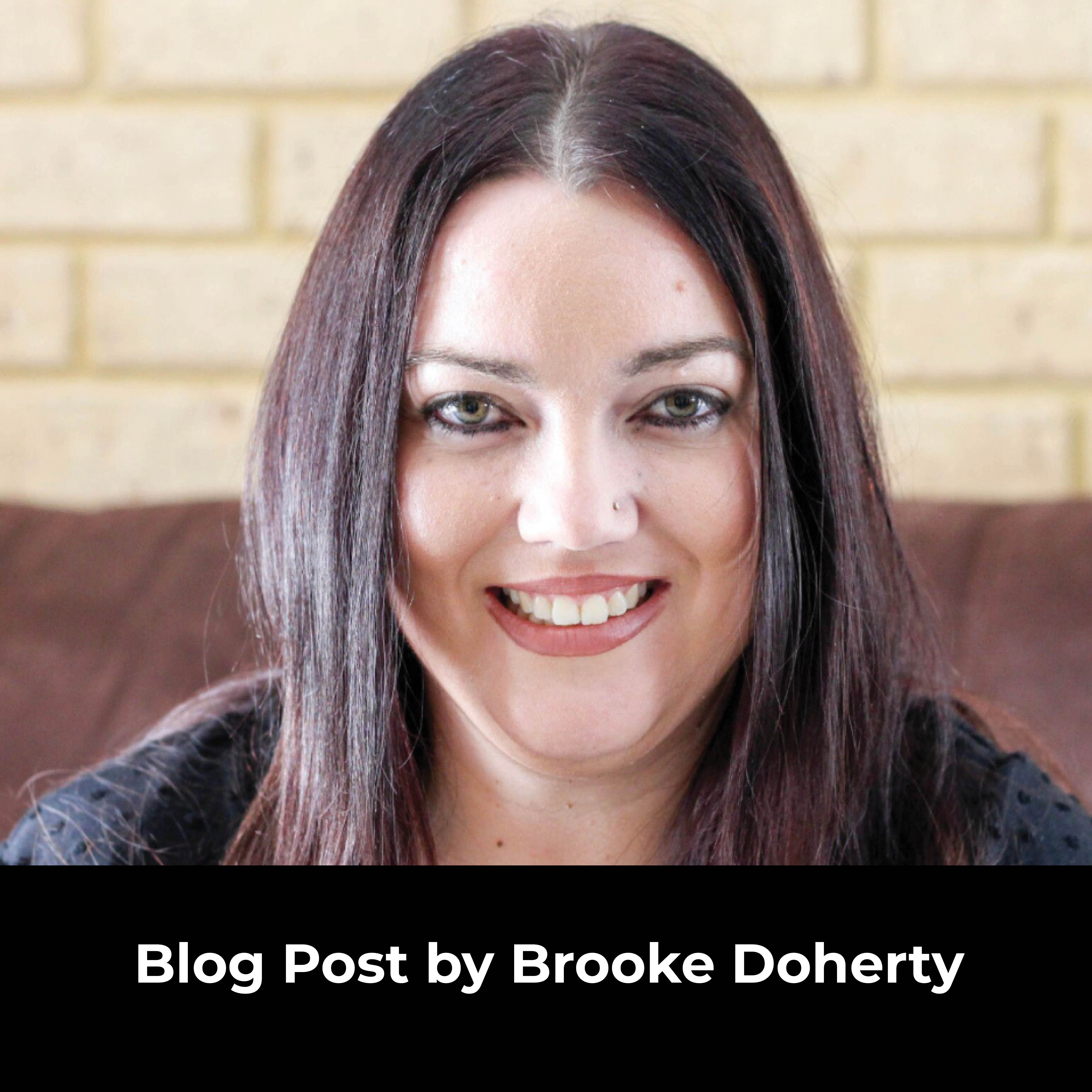 Head and shoulder shot of woman with long brown hair smiling at the camera.  white text overlay on a black background says, blog post by Brooke Doherty