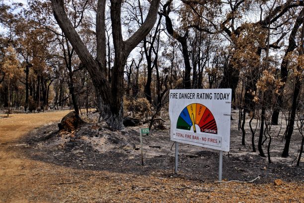 bushfire area with a fire danger sign. bushfire area with a fire danger sign.