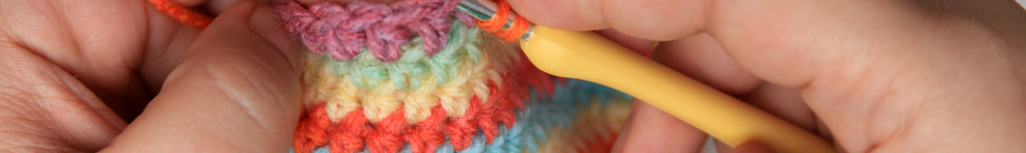 closeup of someone crocheting