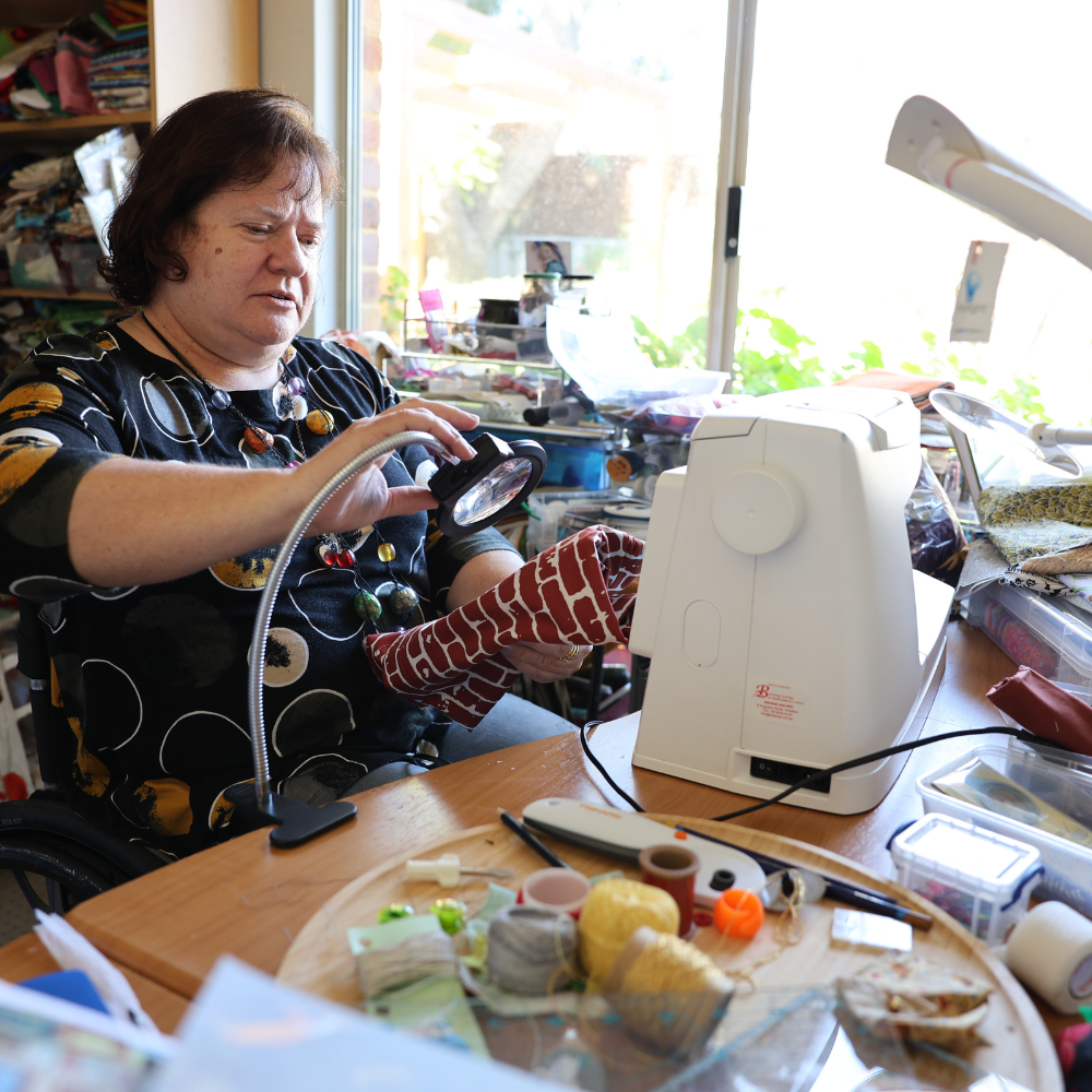 a photo of a woman in a craft room