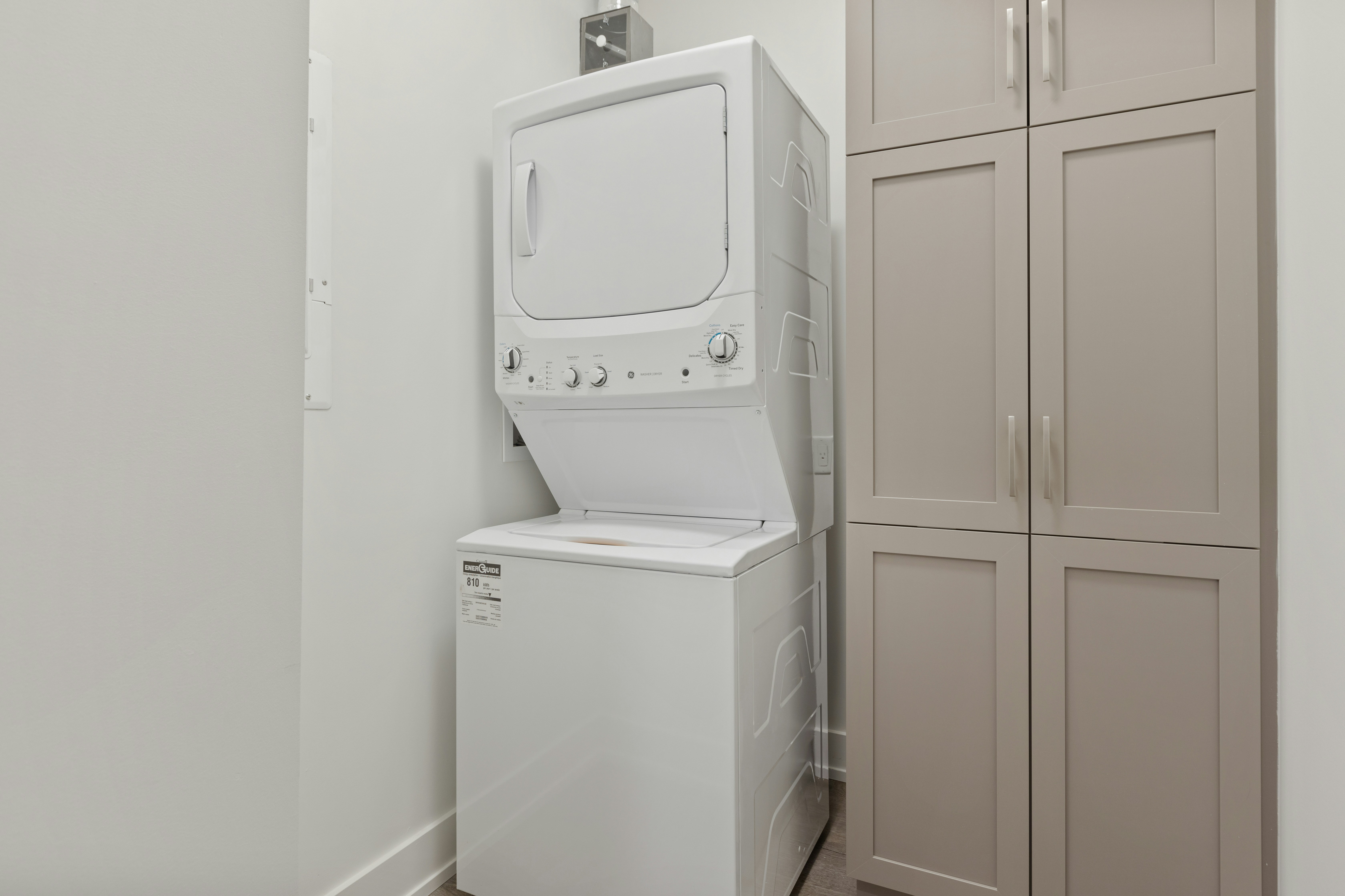 point3d-commercial-imaging-ltd-U6VZOrQinKs-unsplash a two part washer and dryer in an apartment