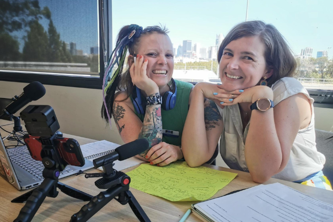 Q&A with Jacqui article header photo of two women smiling happily at the camera, with various podcasting AT items on the left