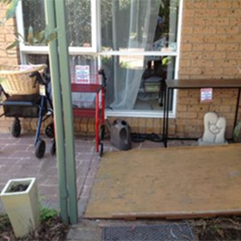 Jessica Smith A row of mobility devices outside the front of a house with baskets on the top ready for deliveries